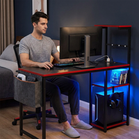 Gaming Desk with Power Outlets, 44 Inch Led Gamer Desk with 4 Tiers Reversible Shelves, PC Gaming Table with Headset Hook & Side Storage Bag for Bedroom (Black 3D Carbon Fiber) — Lifestyle